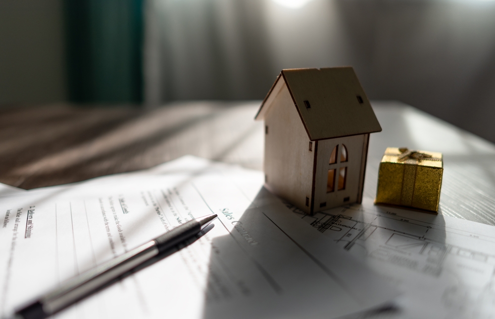 home title/loan concept, paperwork on desk